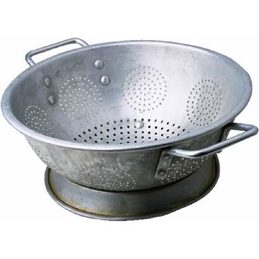 from  latin  colare  "to sieve"] a metal or plastic bowl with